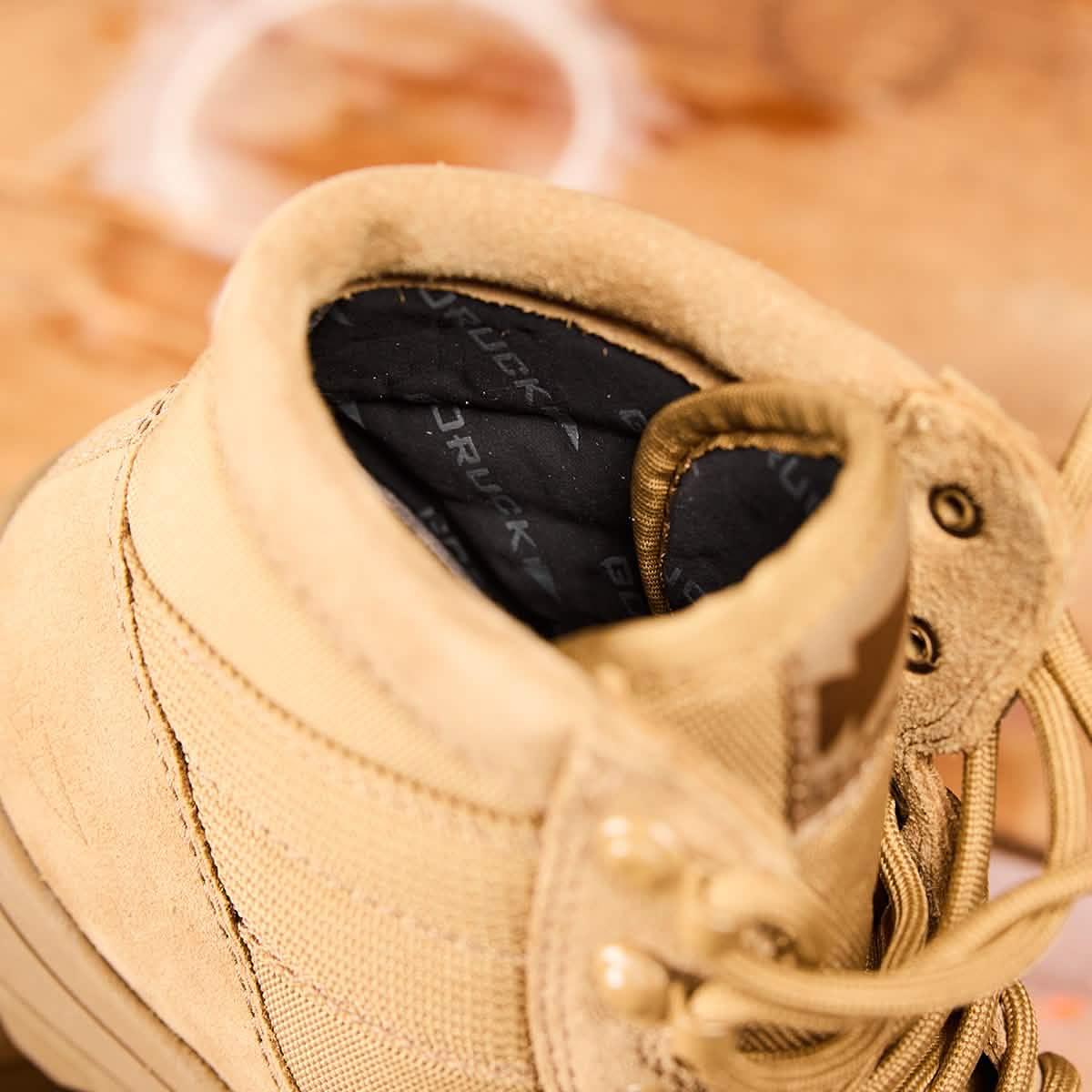 GORUCK tan rucking boot close-up, rugged suede and mesh design with branded black insole