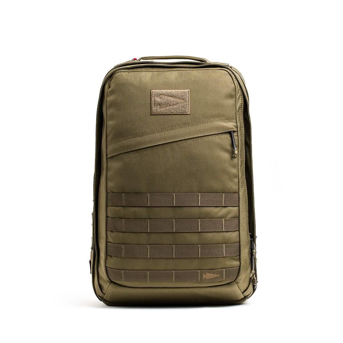 GORUCK olive green rucksack backpack with MOLLE webbing, front zip pocket, rugged gear design