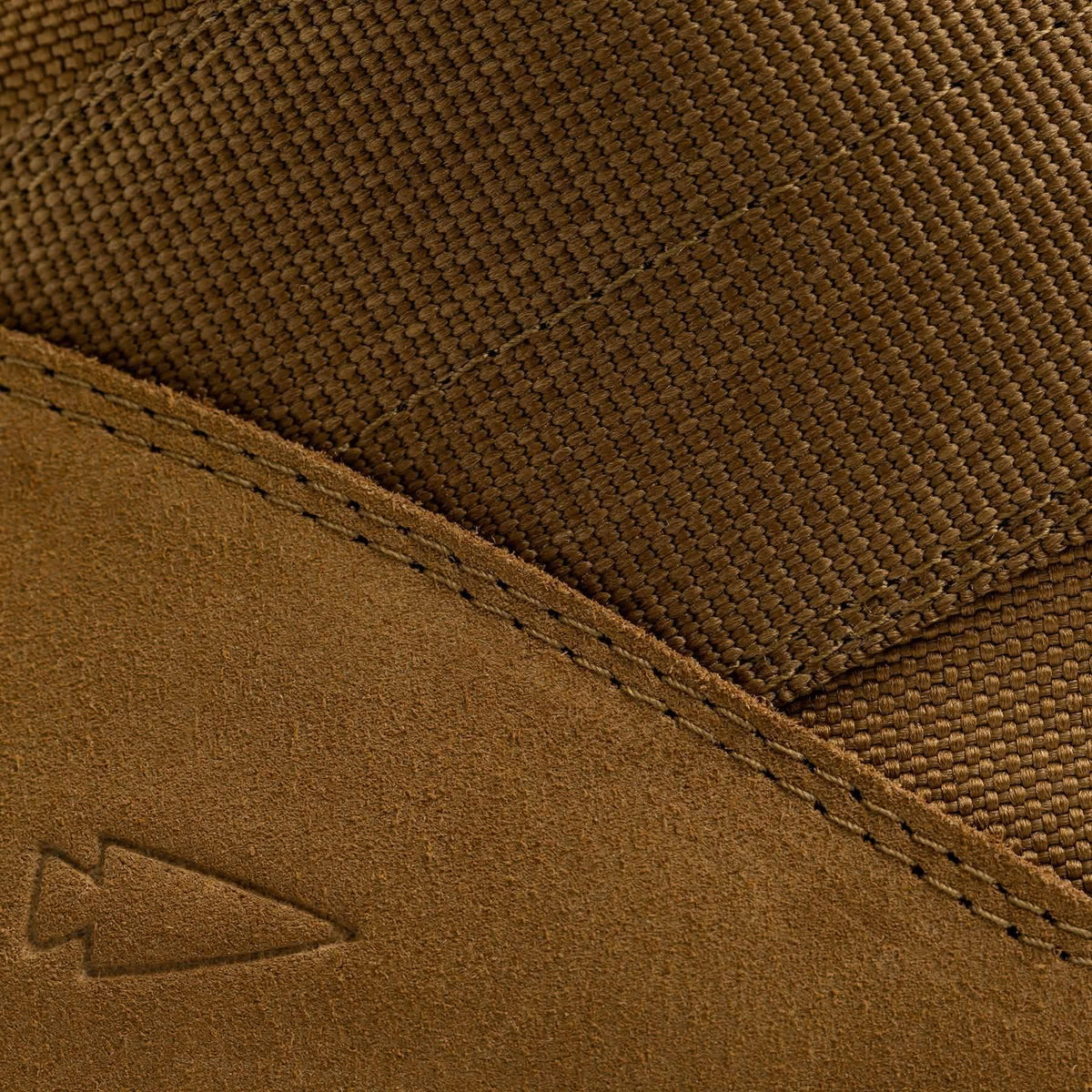 Closeup of GORUCK rucking boot with brown suede and nylon fabric detail