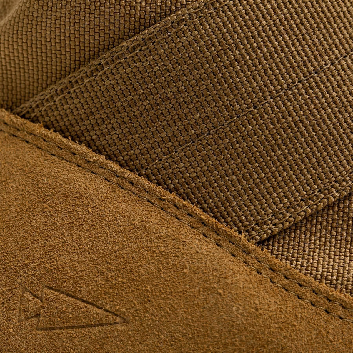 Close-up of GORUCK brown rucking shoe with durable suede and nylon material details.