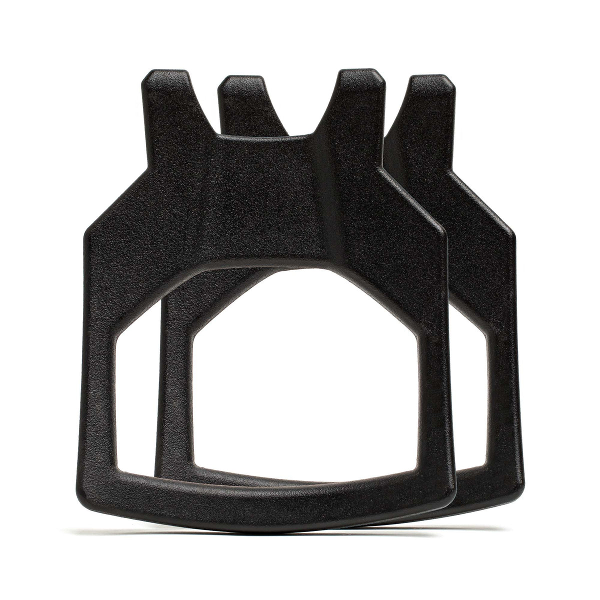 Two Curved Ruck Plates, black and resembling gear like a rucking weight vest, overlap and stand upright on a white background.