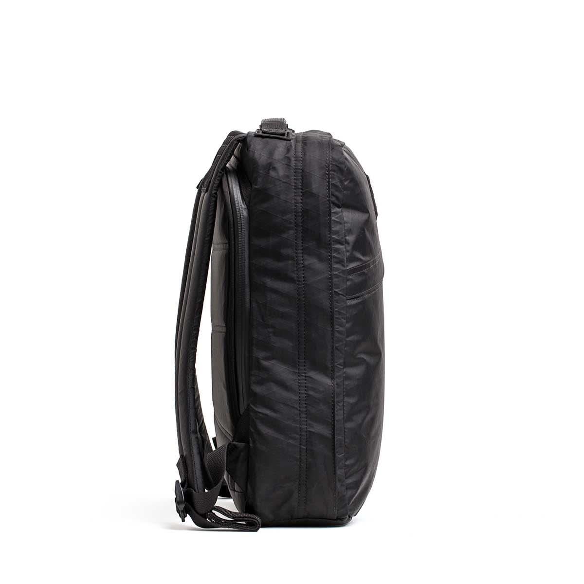 Side view of GORUCK black rucking backpack with durable straps and sleek design