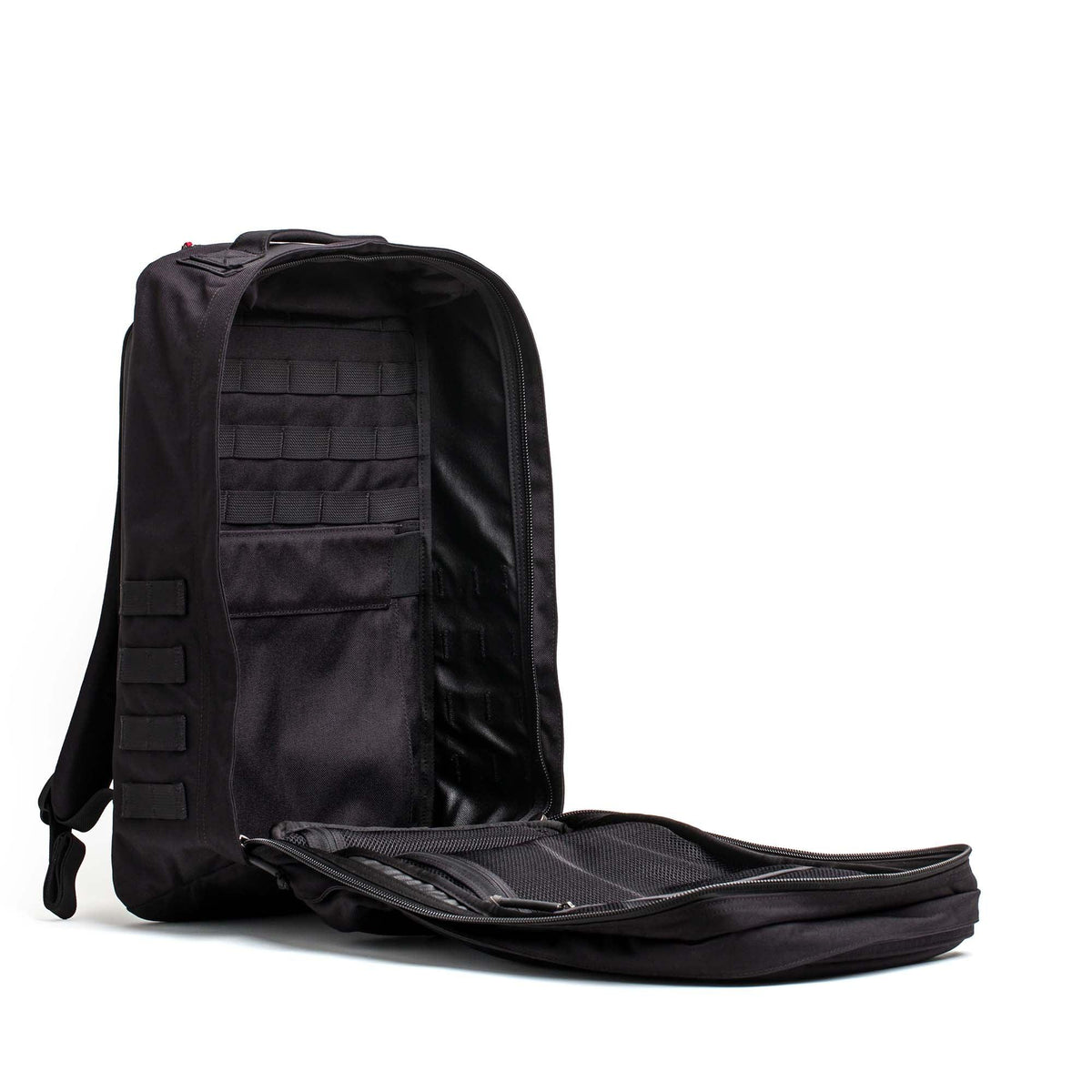 Open GORUCK GR2 34L black rucksack showing spacious interior and durable nylon shell