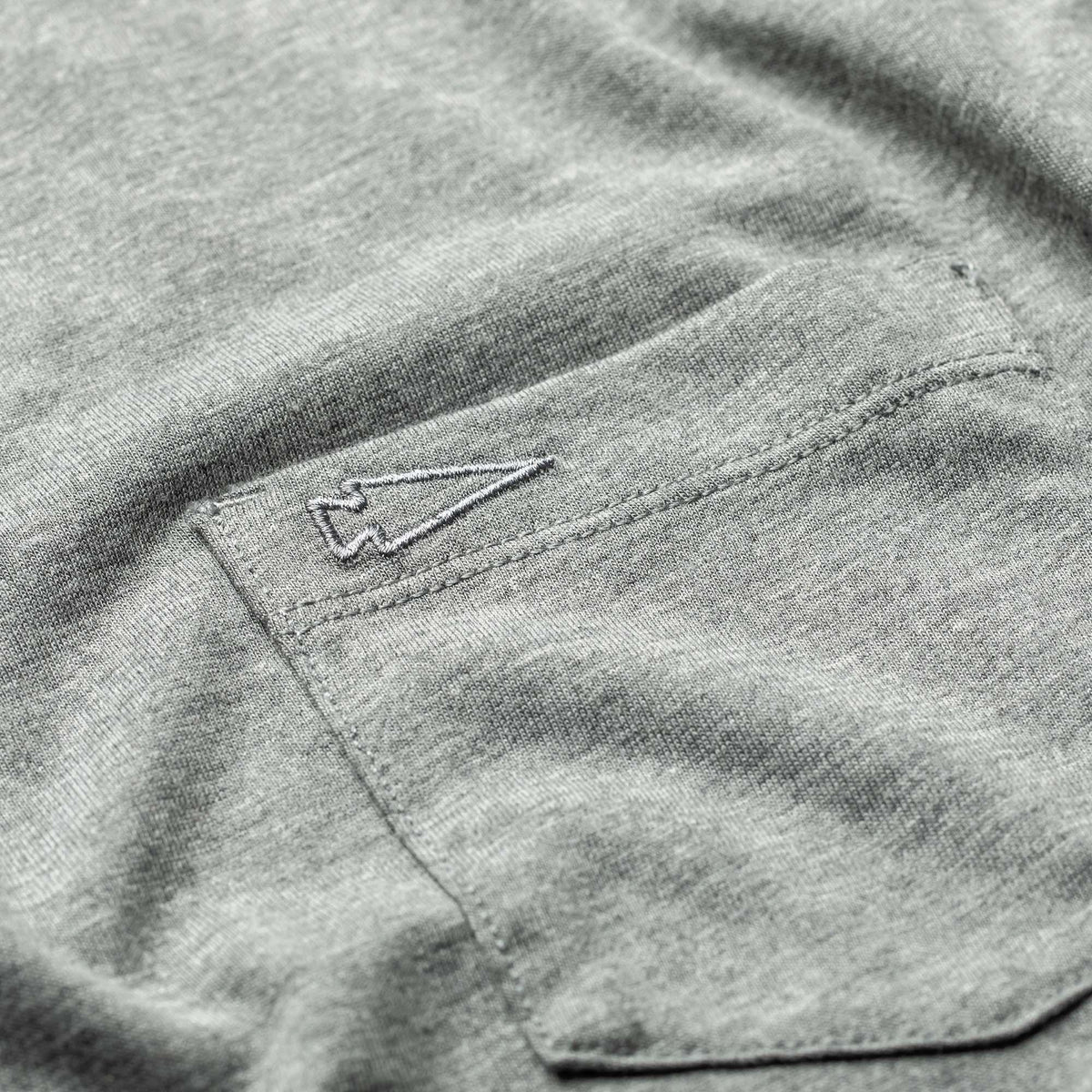 GORUCK men's heather grey triblend t-shirt with pocket and spearhead outline embroidery