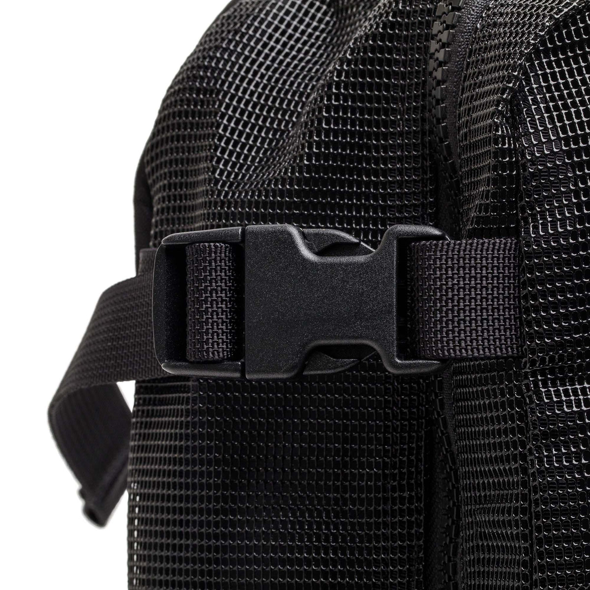 GORUCK black mesh rucksack close-up showing durable buckle and textured fabric