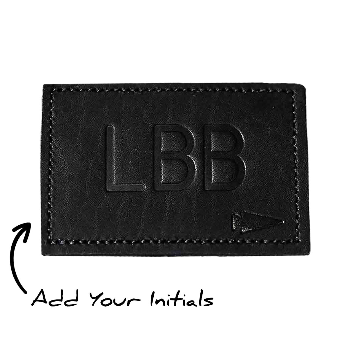 The "Patch - Custom Leather Monogram" is a black leather patch with an embossed "LBB," an arrow symbol, and "Add Your Initials" text indicating where to customize. It's perfect for adding a personalized touch with your initials.