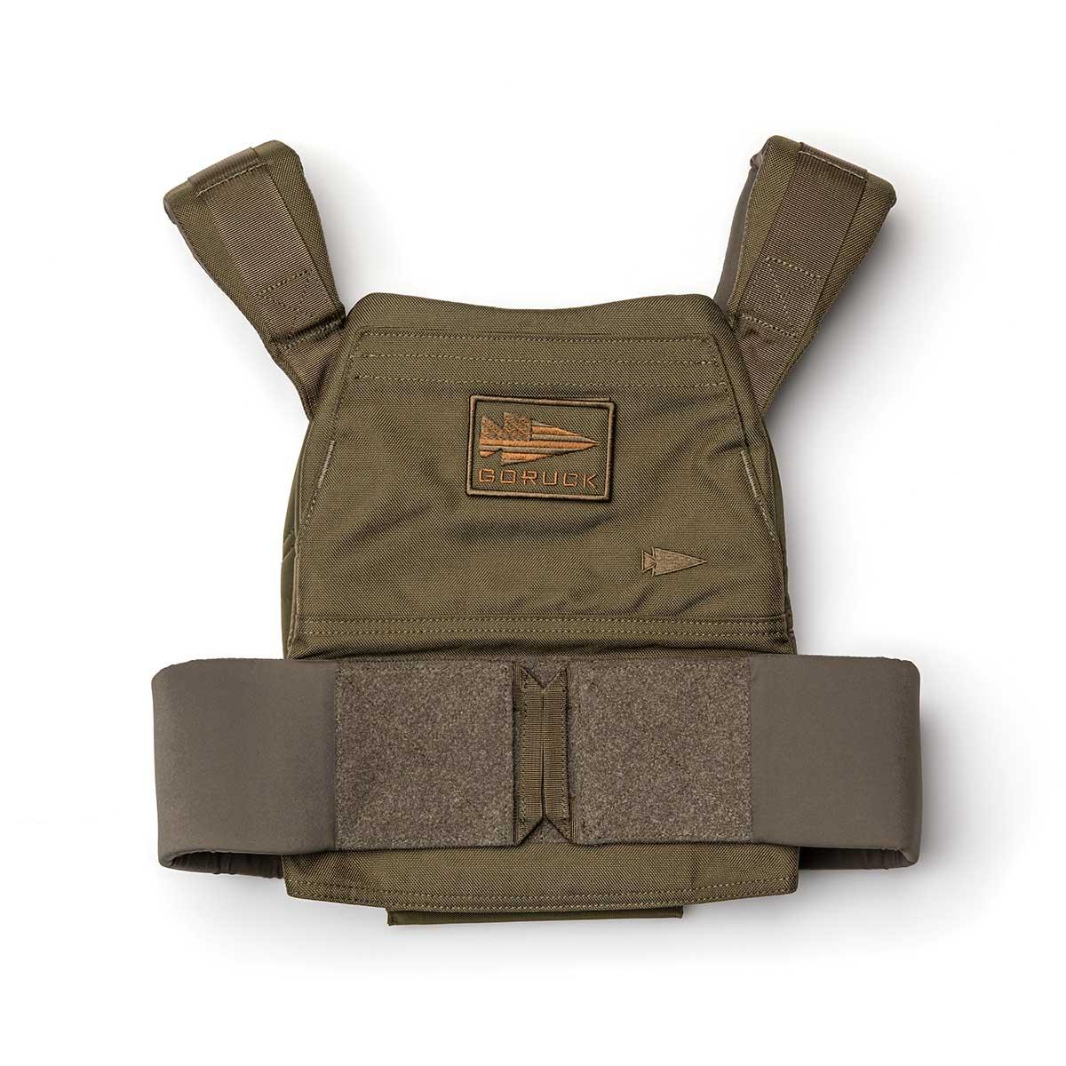 Olive green GORUCK weight vest designed for rucking, featuring a branded chest patch and a wide hook-and-loop waistband.