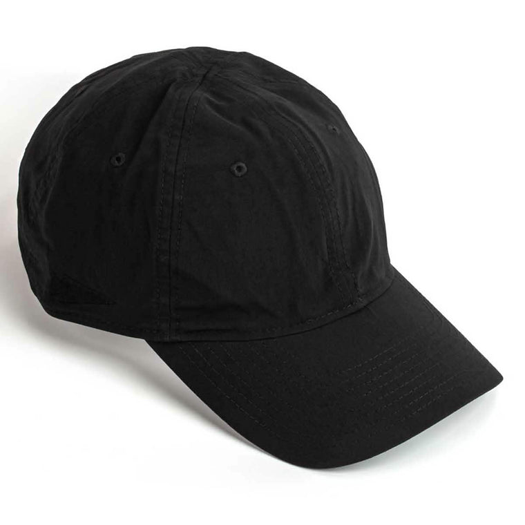 GORUCK black rucking hat with curved brim, tough lightweight cap on white background