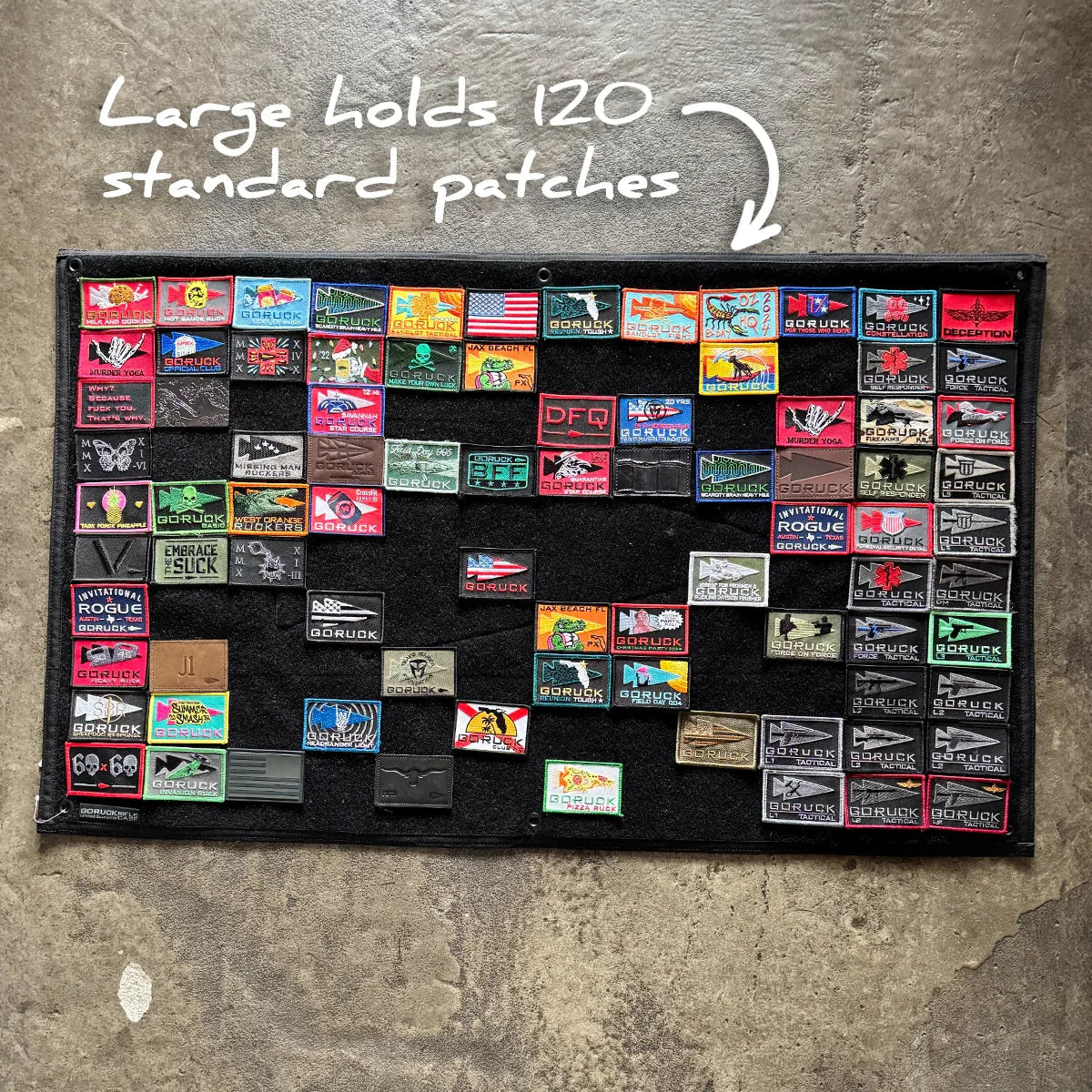 GORUCK large patch board on concrete, displaying colorful rucking gear patches, holds 120 patches